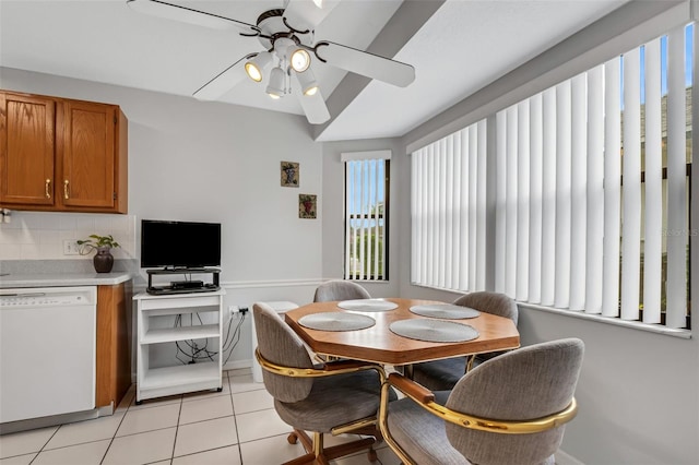 dining room with ceiling fan and light tile patterned floors