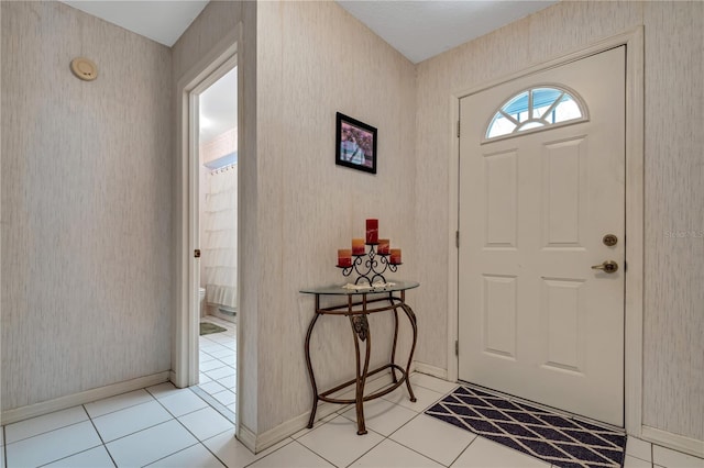 entryway featuring light tile patterned floors