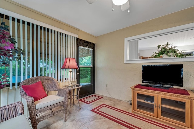 interior space featuring ceiling fan