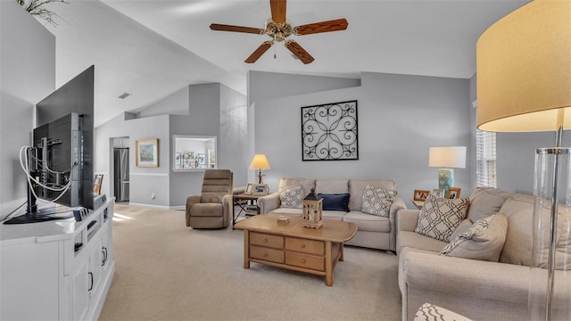 carpeted living room featuring vaulted ceiling and ceiling fan