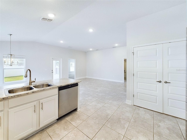 kitchen with pendant lighting, white cabinets, sink, vaulted ceiling, and stainless steel dishwasher