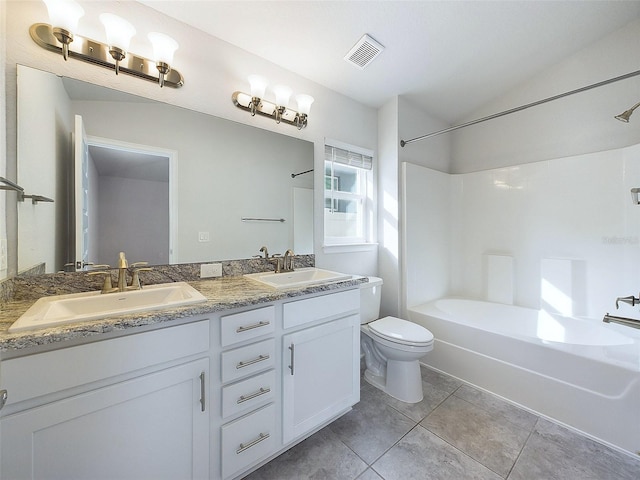 full bathroom with tile patterned flooring, vanity, toilet, and tub / shower combination