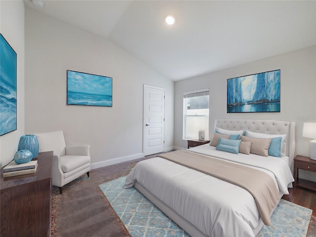 carpeted bedroom featuring vaulted ceiling