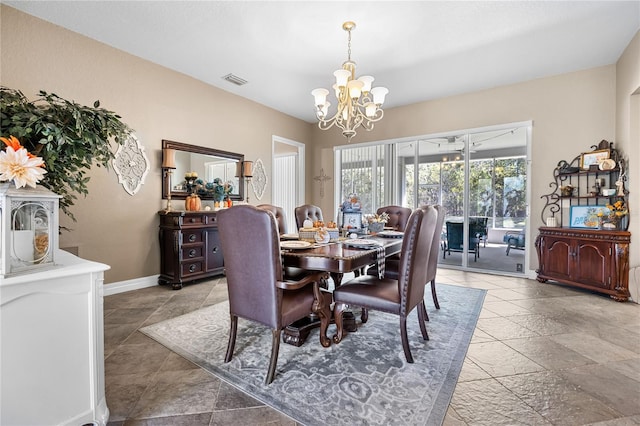 dining room featuring a chandelier