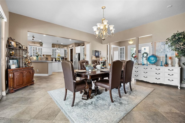 dining area with a notable chandelier