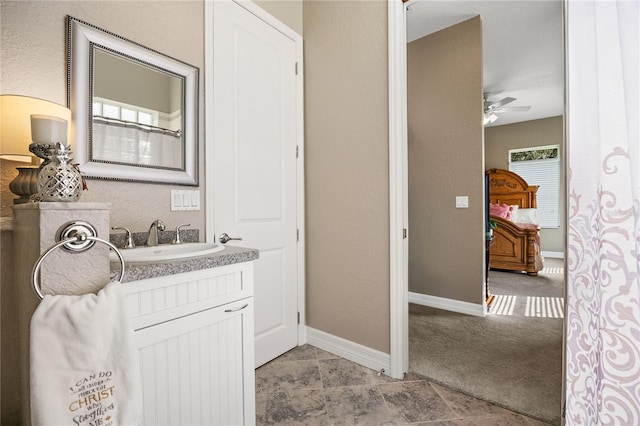 bathroom with vanity and ceiling fan