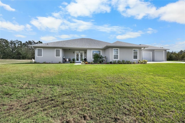 single story home featuring french doors, a garage, and a front lawn