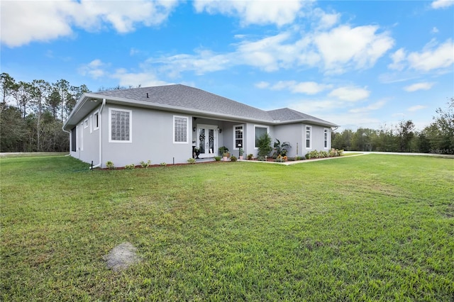 single story home with a front yard