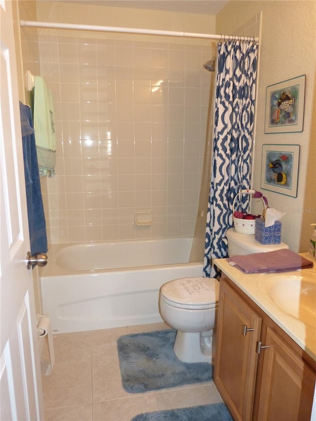 full bathroom with tile patterned floors, vanity, shower / bath combination with curtain, and toilet