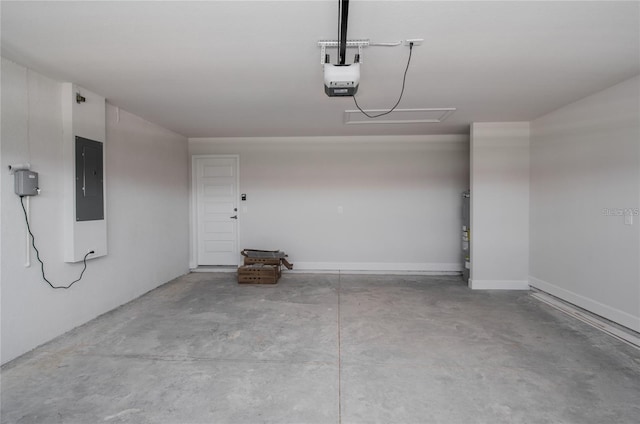 garage featuring a garage door opener, electric panel, and water heater