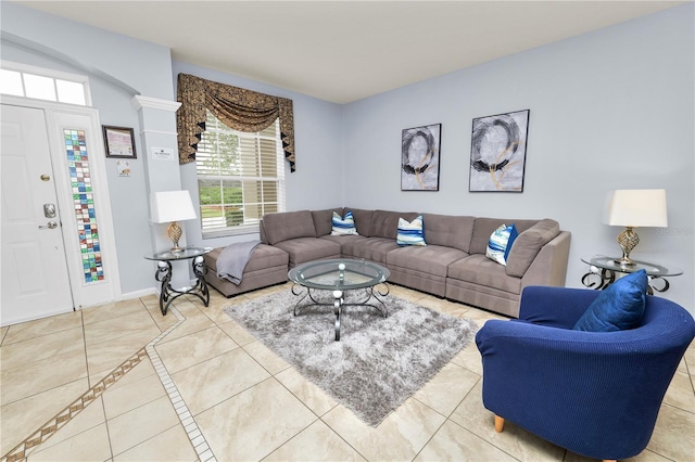 living room with tile patterned floors