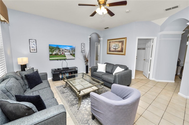 living room featuring ceiling fan and light tile patterned floors