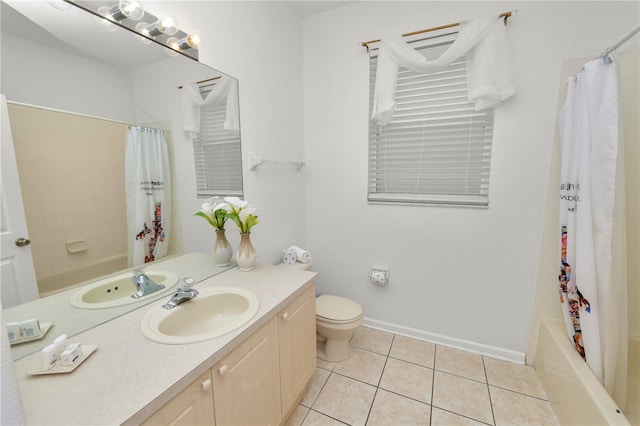 full bathroom featuring tile patterned flooring, vanity, shower / bath combo, and toilet