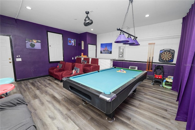 game room with hardwood / wood-style floors and pool table