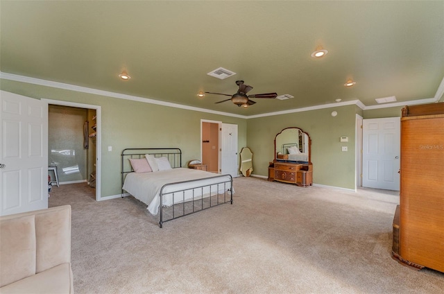 carpeted bedroom featuring ceiling fan and ornamental molding