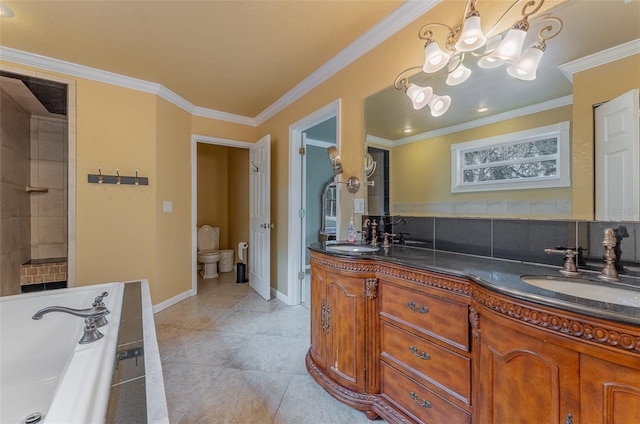 bathroom featuring vanity, tile patterned floors, toilet, ornamental molding, and tasteful backsplash