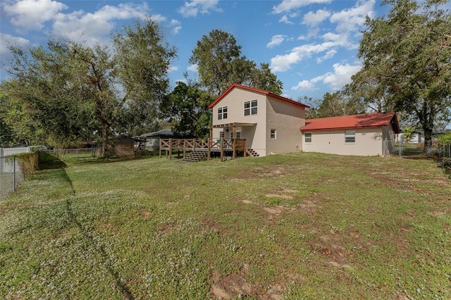 view of yard with a deck