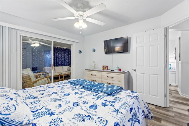 bedroom with ceiling fan, a closet, and light hardwood / wood-style flooring