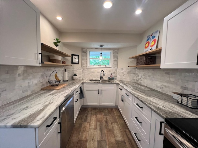 737 Butternut Pl, Lakeland, FL 33813 - kitchen featuring open shelves, stainless steel dishwasher, a sink, dark wood-style flooring, and light stone counters