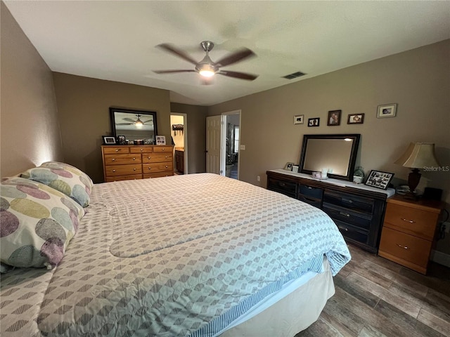 bedroom featuring hardwood / wood-style floors and ceiling fan