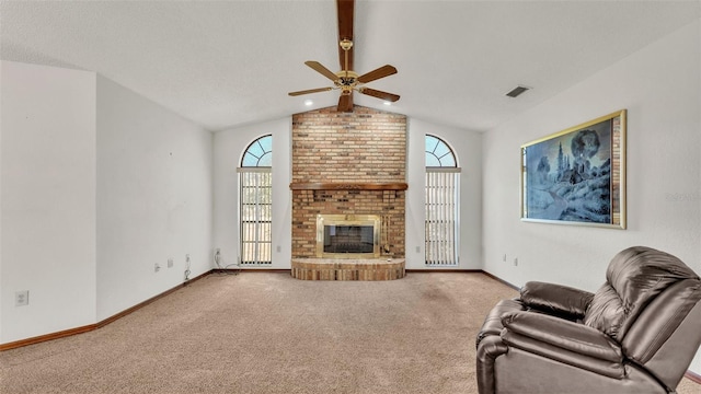 living room featuring carpet and plenty of natural light