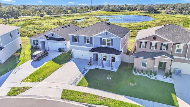 drone / aerial view featuring a water view