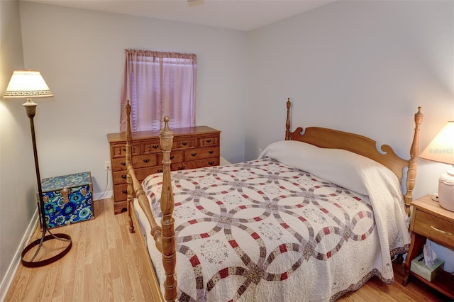 bedroom with light wood-type flooring