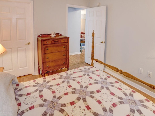 bedroom with light hardwood / wood-style flooring