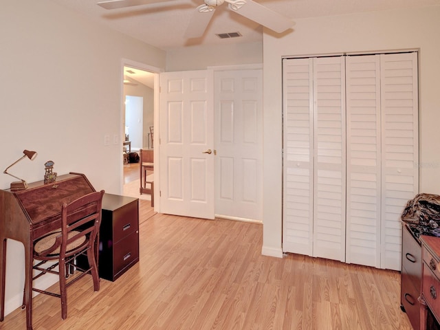 office area featuring ceiling fan and light wood-type flooring