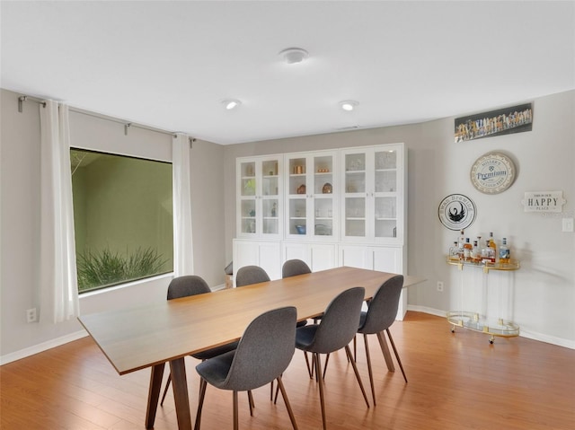 dining room featuring wood-type flooring