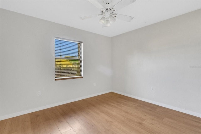 unfurnished room with ceiling fan and light hardwood / wood-style flooring