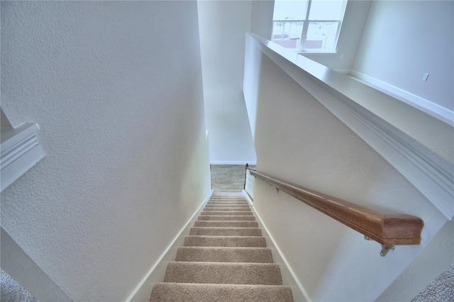 stairs with a textured wall