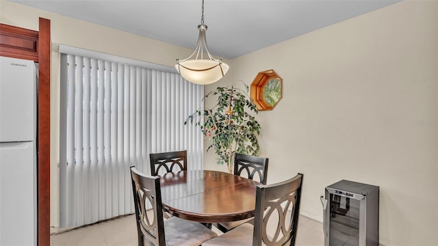 dining area with light tile patterned floors