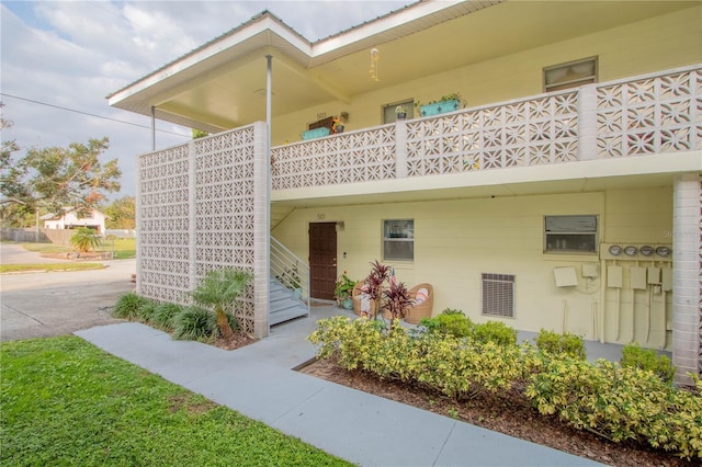 doorway to property with a balcony