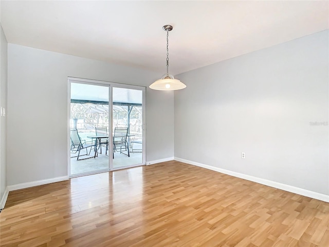 spare room with light wood-type flooring