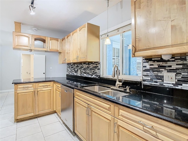 kitchen featuring dishwasher, sink, hanging light fixtures, tasteful backsplash, and kitchen peninsula