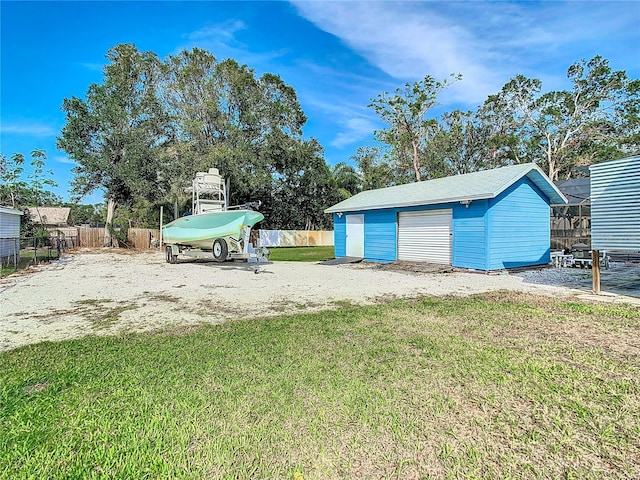 garage with a lawn