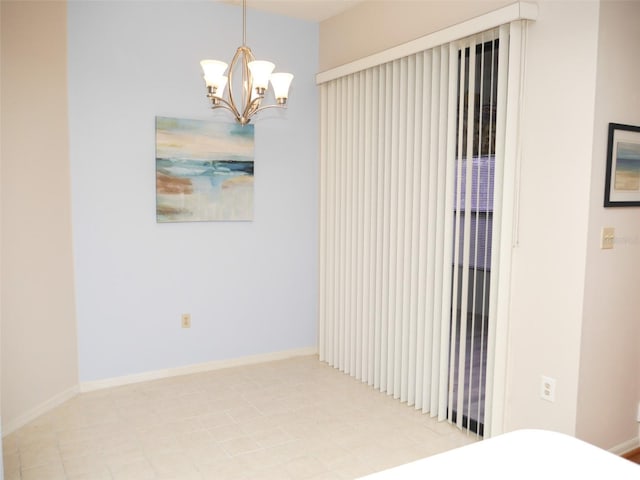 interior space with a notable chandelier