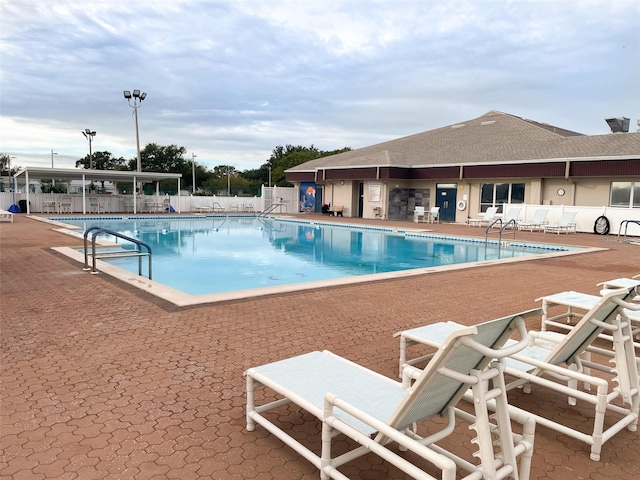 view of pool featuring a patio area