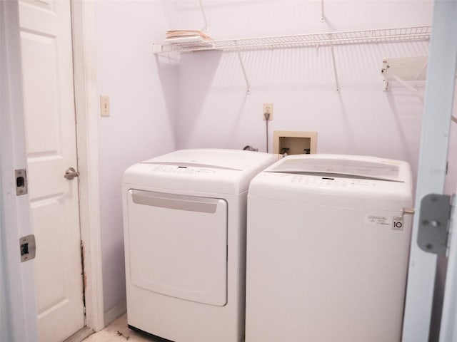 laundry area featuring separate washer and dryer