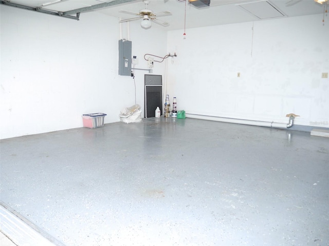 garage featuring ceiling fan and electric panel