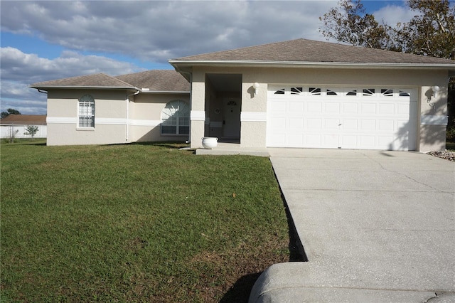 ranch-style home with a front yard and a garage