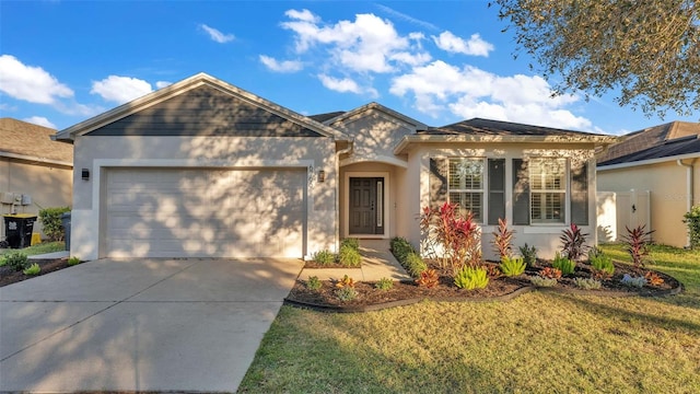 ranch-style house featuring a garage and a front yard