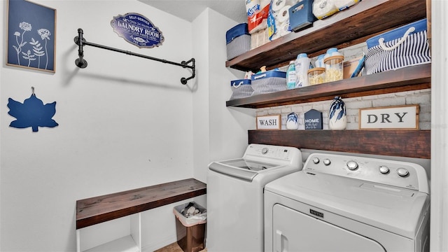 washroom with laundry area and independent washer and dryer