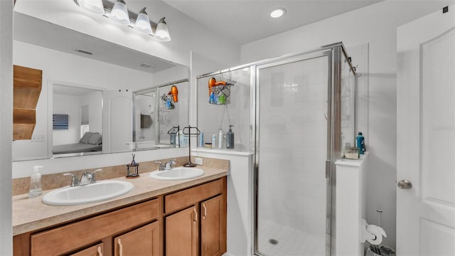 bathroom featuring vanity and walk in shower