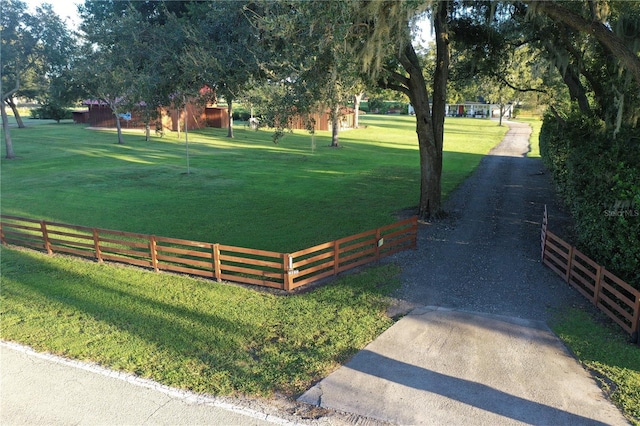 surrounding community featuring a lawn