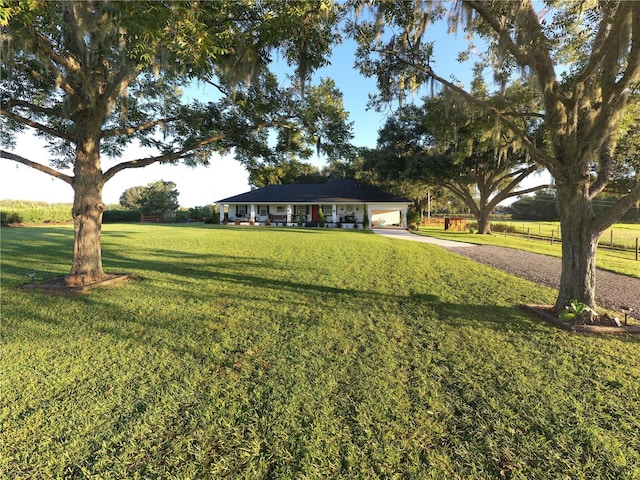 view of front facade with a front lawn