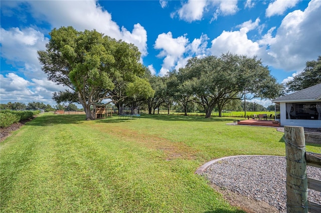 view of yard featuring a deck