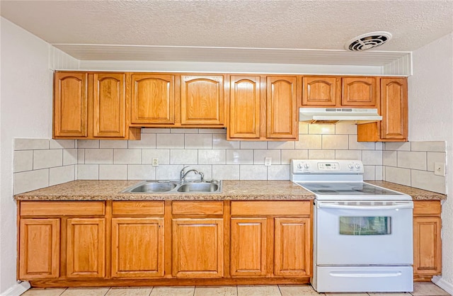 kitchen with backsplash, a textured ceiling, sink, electric stove, and light tile patterned floors