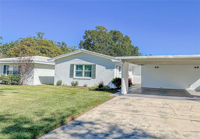 ranch-style home with a front lawn